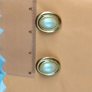 Gold tone + faux pearl clip on earrings